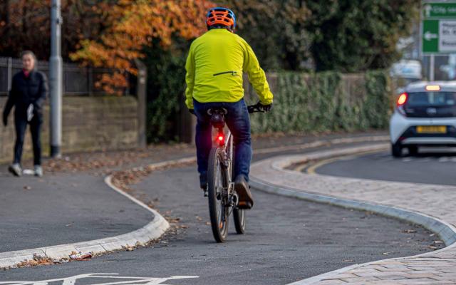 Cyclist riding in a cycle lane