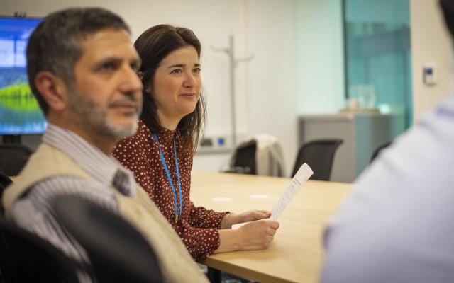 Two members of Leeds City Council staff during a meeting